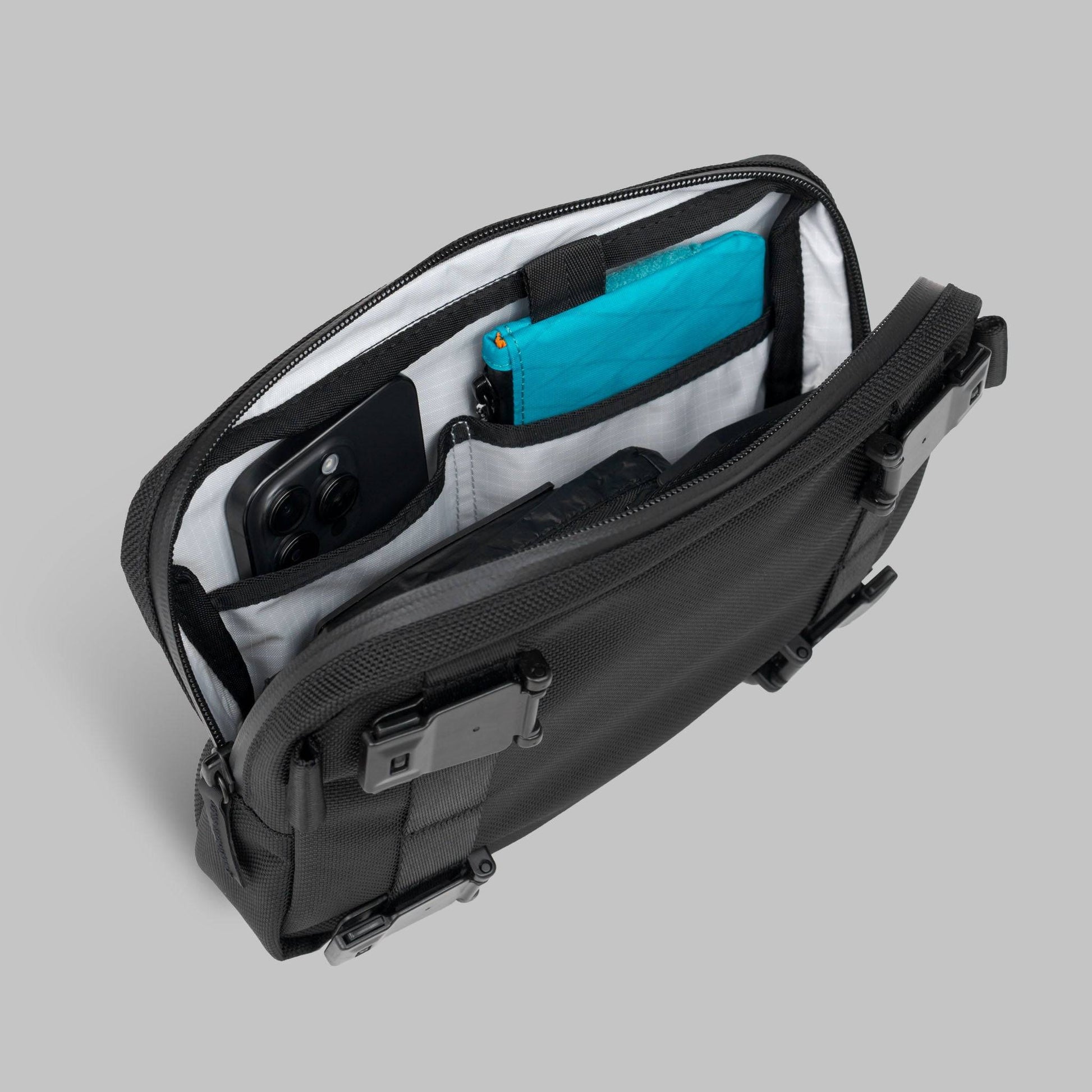 Interior of the Rework Gear Essentials Case with items inside it.