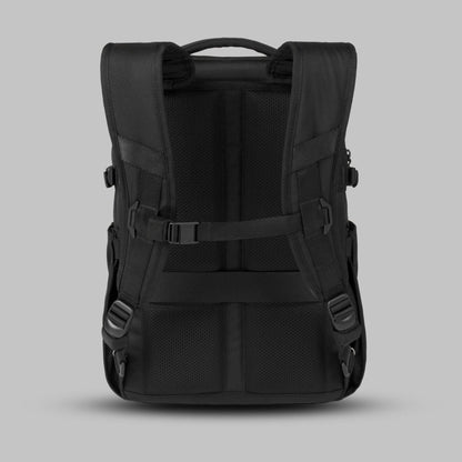 Back view of the 22L Reset Pack by Rework Gear against a gray background.