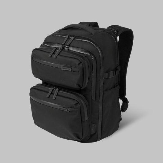 Modular backpack called Reset System by Rework Gear placed isometrically against a gray background.